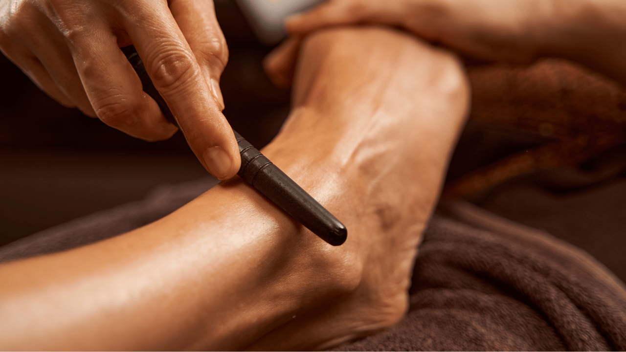 Stimulation de la surface du pied à l'aide d'un bâton