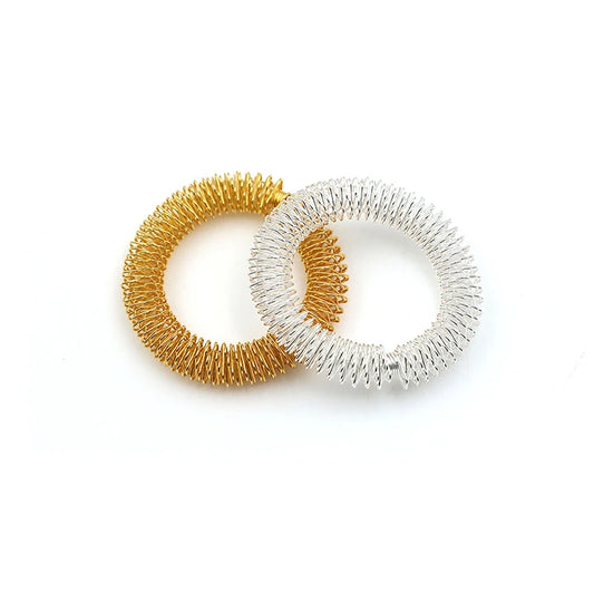 bracelets d'acupression dorés et argentés
