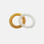 bracelets d'acupression dorés et argentés