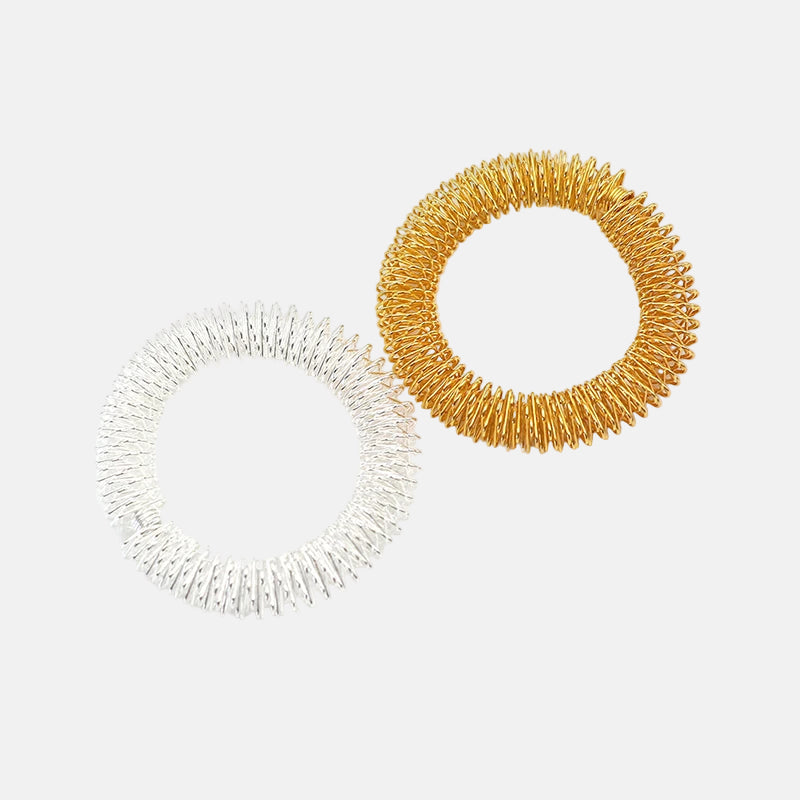 bracelet d'acupression dorée et argentée